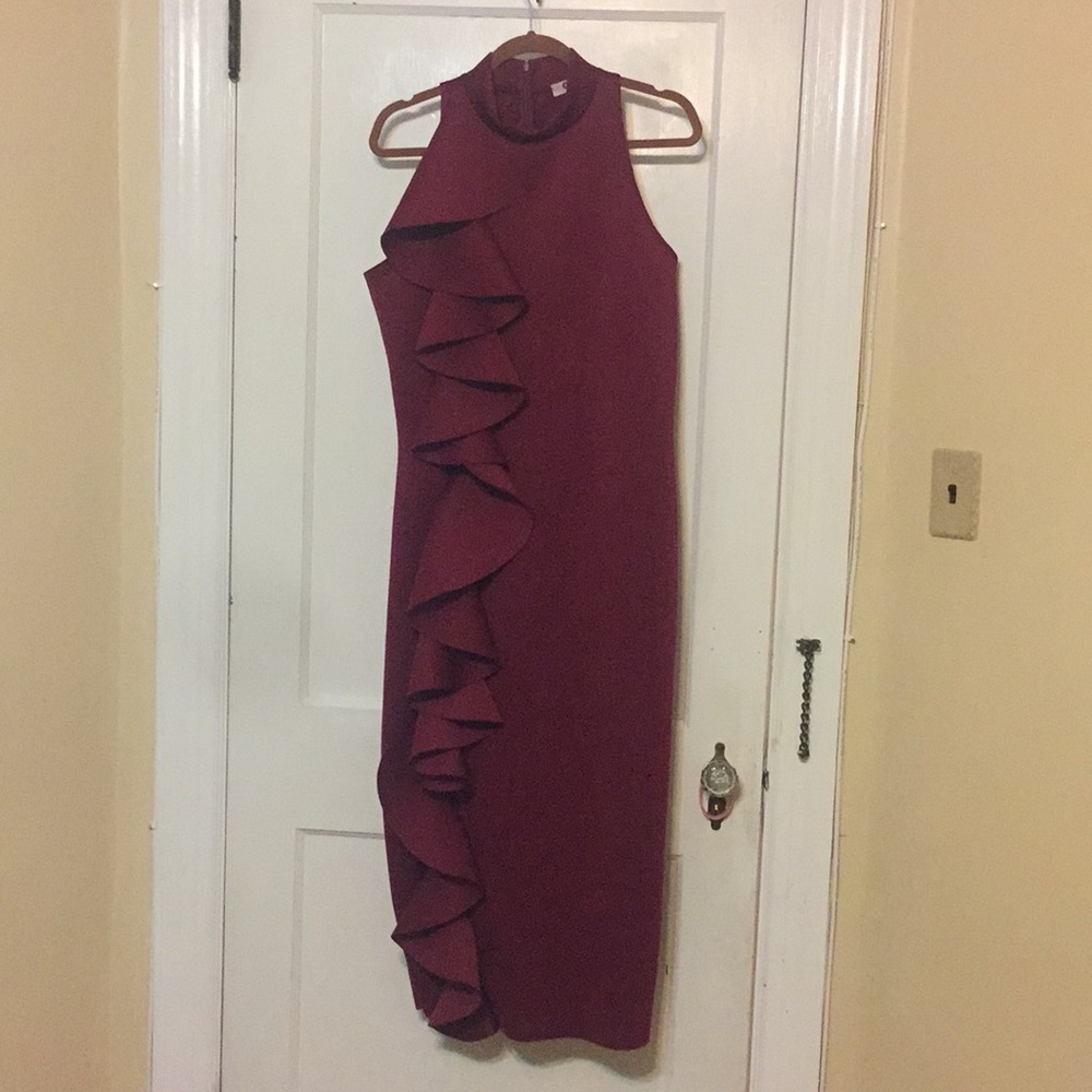 Calf length scuba material ruffel dress worn once